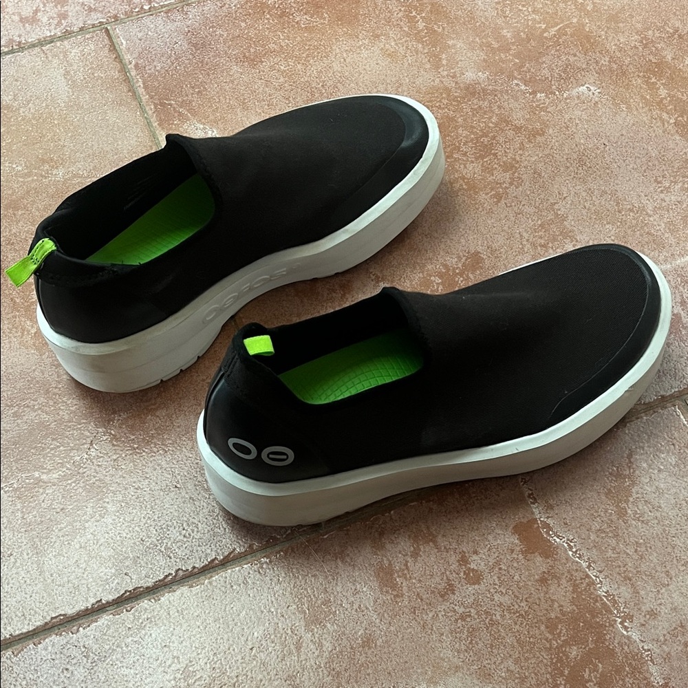 Oofos Black Slip-On Sneakers with Neon Green Insole